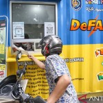 Warga mengambil dokumen kependudukan melalui layanan tanpa turun De Fast-1668914526